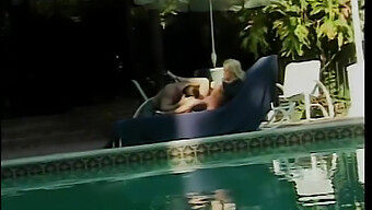 A Couple Enjoys Oral Sex And Poolside Doggy Style In This Video