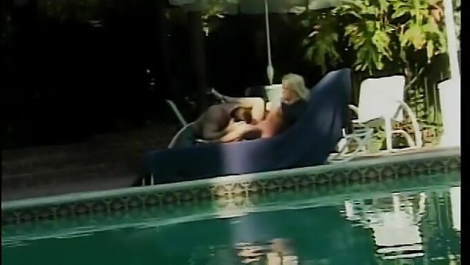 A Couple Enjoys Oral Sex And Poolside Doggy Style In This Video